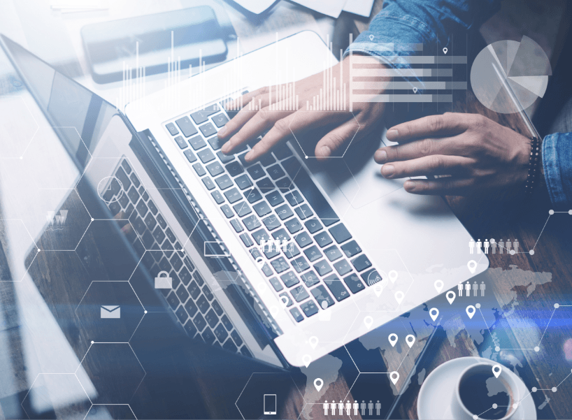 A person working on a laptop overlaid with digital graphics of charts and global network connections, symbolizing digital data analysis or global communications in the context of a Master's program in data science.