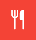 A simple graphic of a white fork and knife icons on a vibrant red background, symbolizing awesome discounts for college students on food or dining.