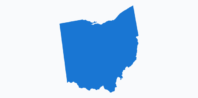 A blue silhouette of the state of Ohio is centered against a light gray background. The shape highlights the state's borders and general geographic outline.